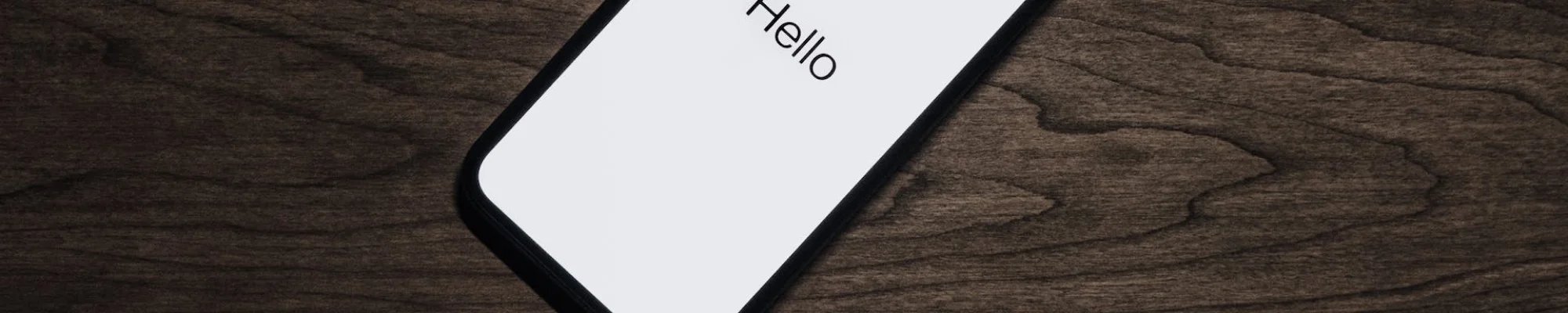 Mobile phone on a hardwood floor
