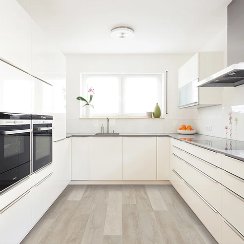 Kitchen with light grey water resistant flooring